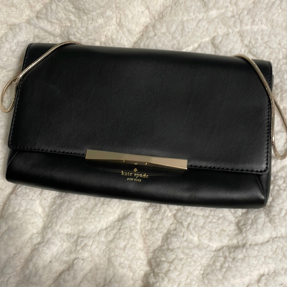 Unused new without rages Kate Spade envelope clutch with gold chain